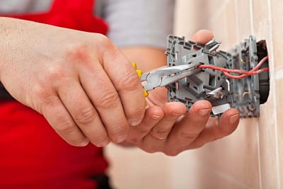 Electrician repairing switch board in NewJersey