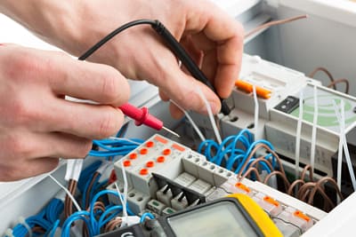 Electrician repairing electrical board in new jersey
